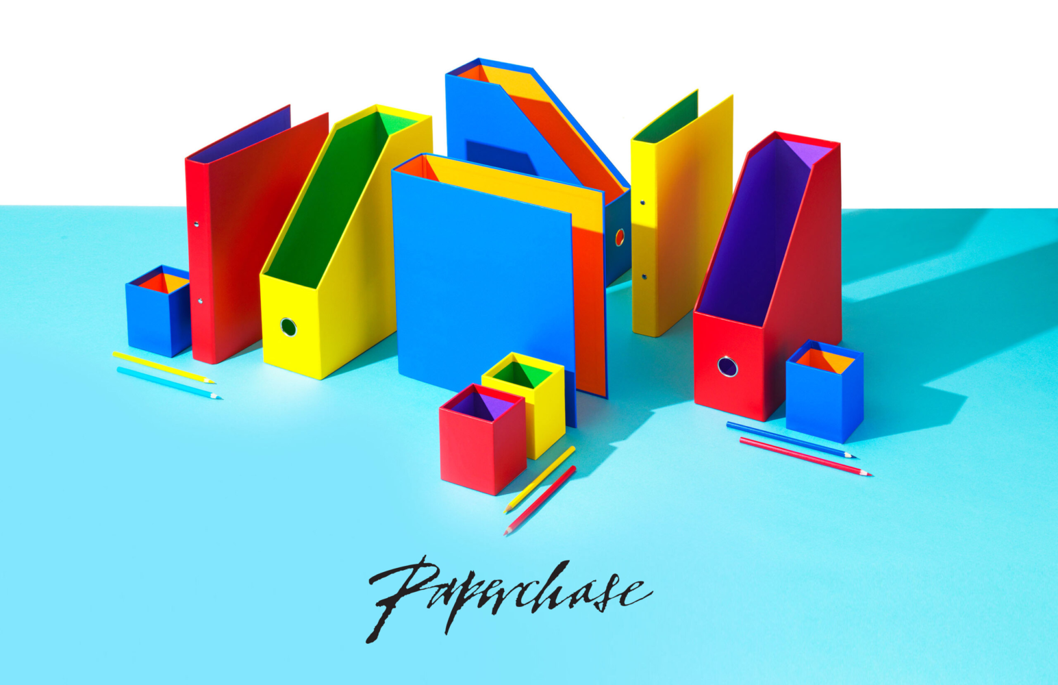 Paperchase advertising still life with colourful ring binders, folders and pencil pots on blue background — Leo Acker, London product photographer and still life photographer Leo Acker Photographer ADVERTISING 